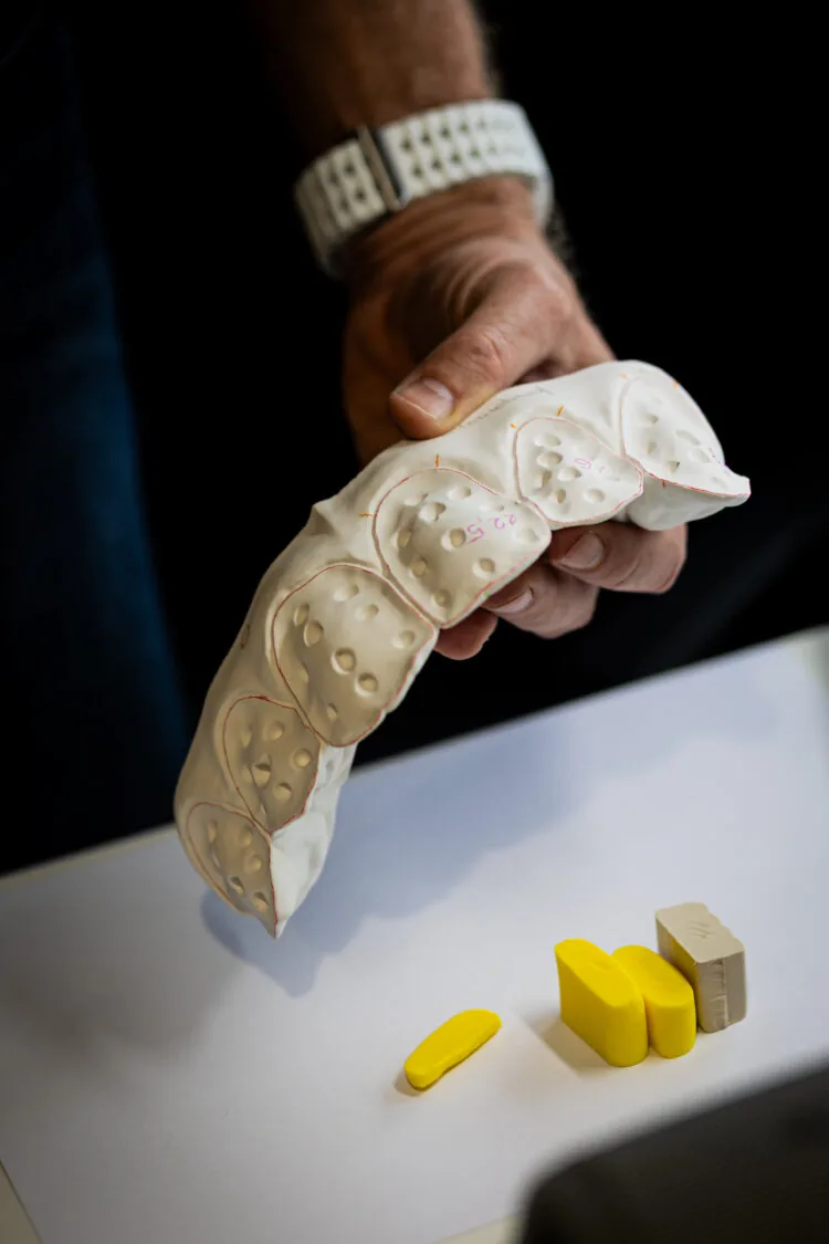 János Makó holding tooth models used for dental morphology training at Private Dental Mentor.